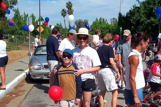 1002 Diane and Jeffrey: Diane and Jeffrey, setting out in our neighborhood parade