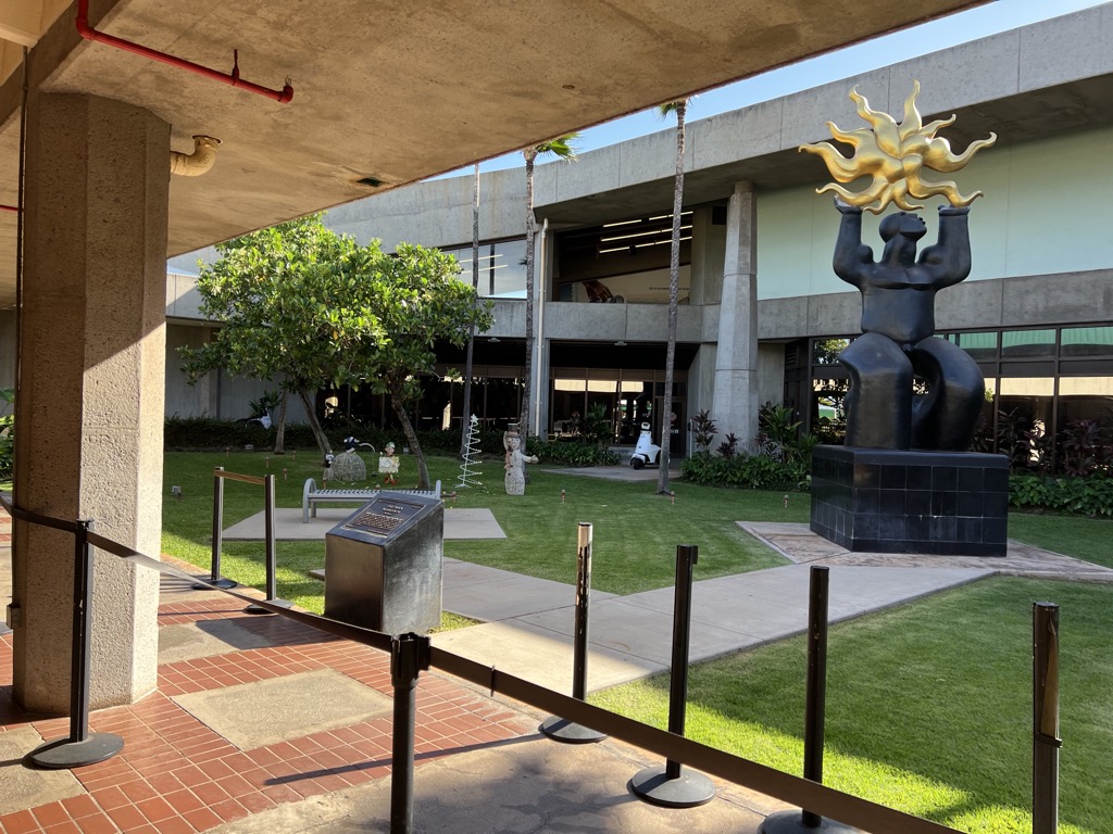 "Maui releasing the Sun" sculpture at Kahului Airport